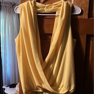 Yellow medium sleeveless blouse